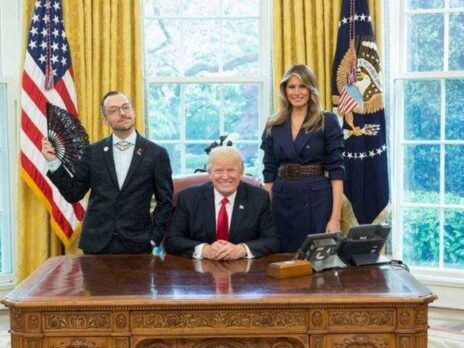 Rhode Island's Teacher of the Year poses next to US president Donald Trump