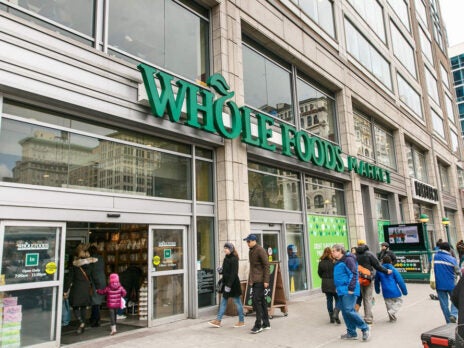 Why does Amazon want to acquire Whole Foods?