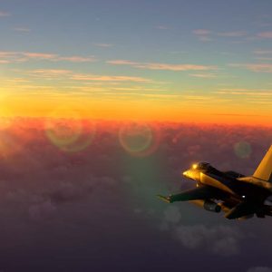 Militar aircraft flying over the amazing sunset.