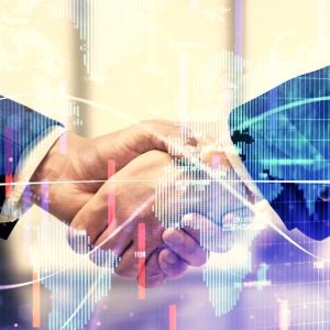 Double exposure of business theme hologram and handshake of two men. Success concept.