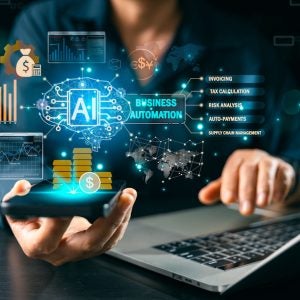 AI business automation interface over smartphone and laptop with finance analytics charts, invoicing, tax calculation, risk analysis, auto payments and supply chain workflow for efficiency. automation